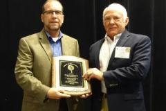 Frank receives plaque